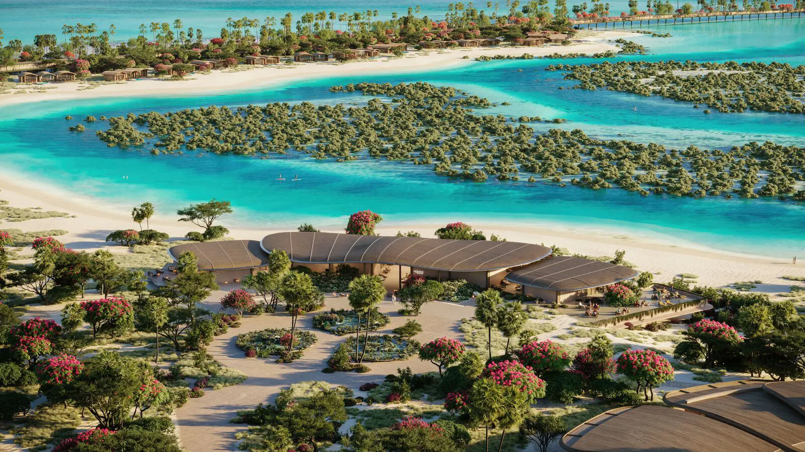 Miraval The Red Sea resort surrounded by turquoise water and greenery